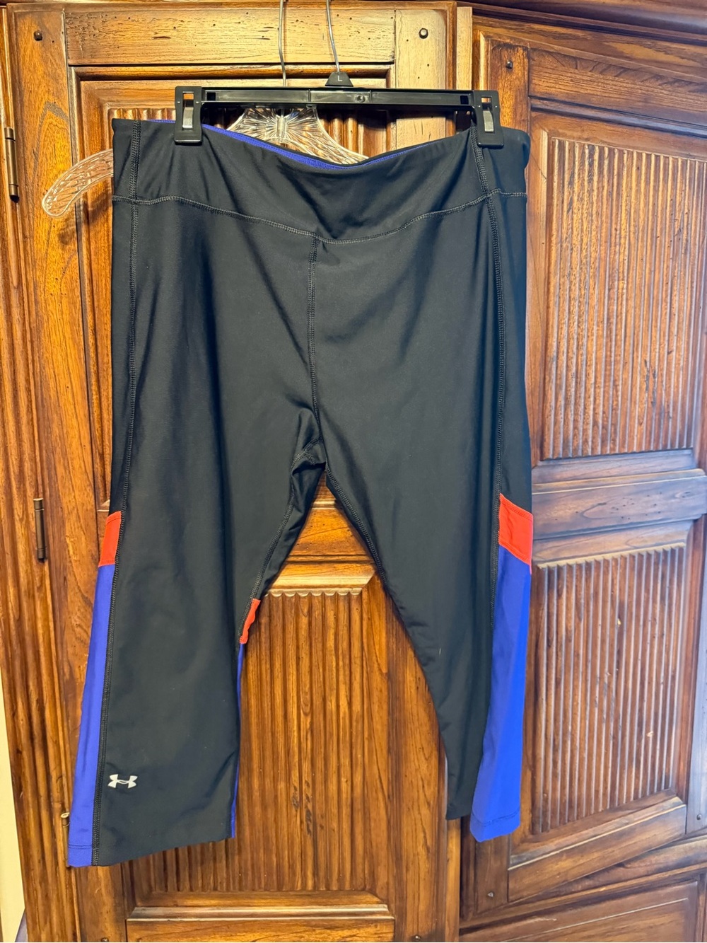 Under Armour Black Capris with Blue Panels & Orange or peachy Accents